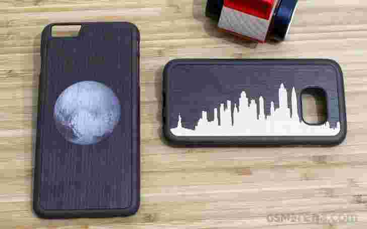 Galaxy S7和iPhone 6s Plus的木箱由雕刻评论