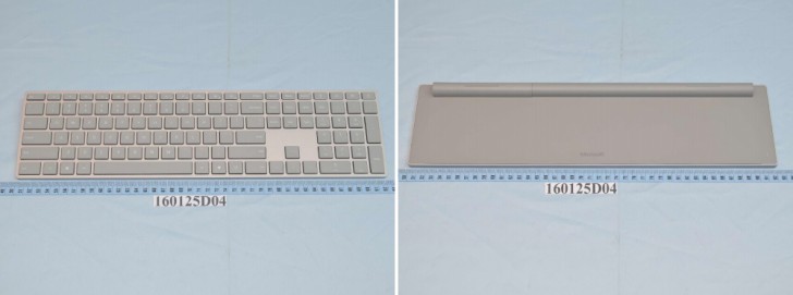 Microsoft曲面键盘和表面鼠标在作品中，如图所示